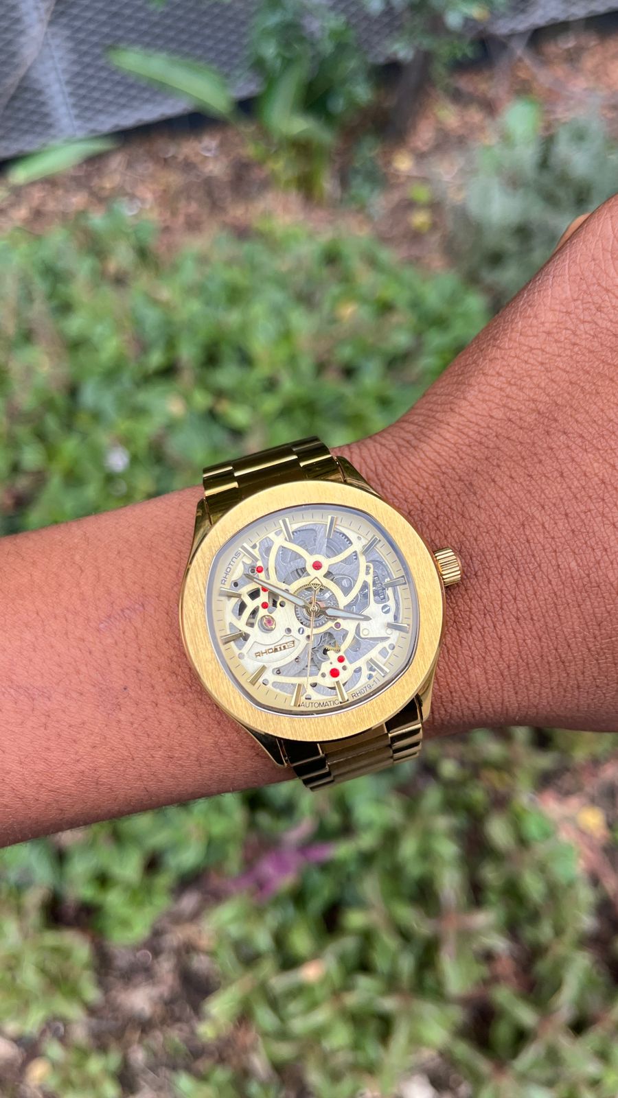 RHOTNS GOLD SKELETON WATCH