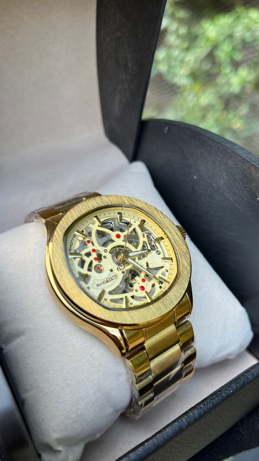 RHOTNS GOLD SKELETON WATCH
